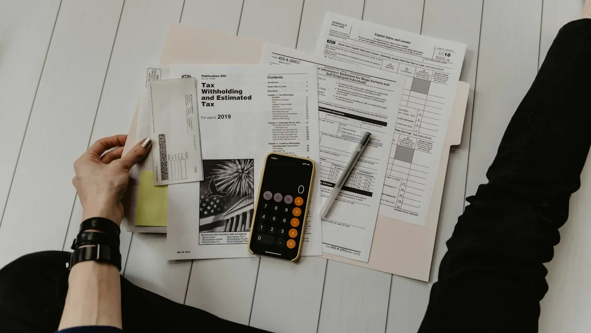 Tax documents and calculator illustrating McKinney ISD VATRE and school bond election coverage