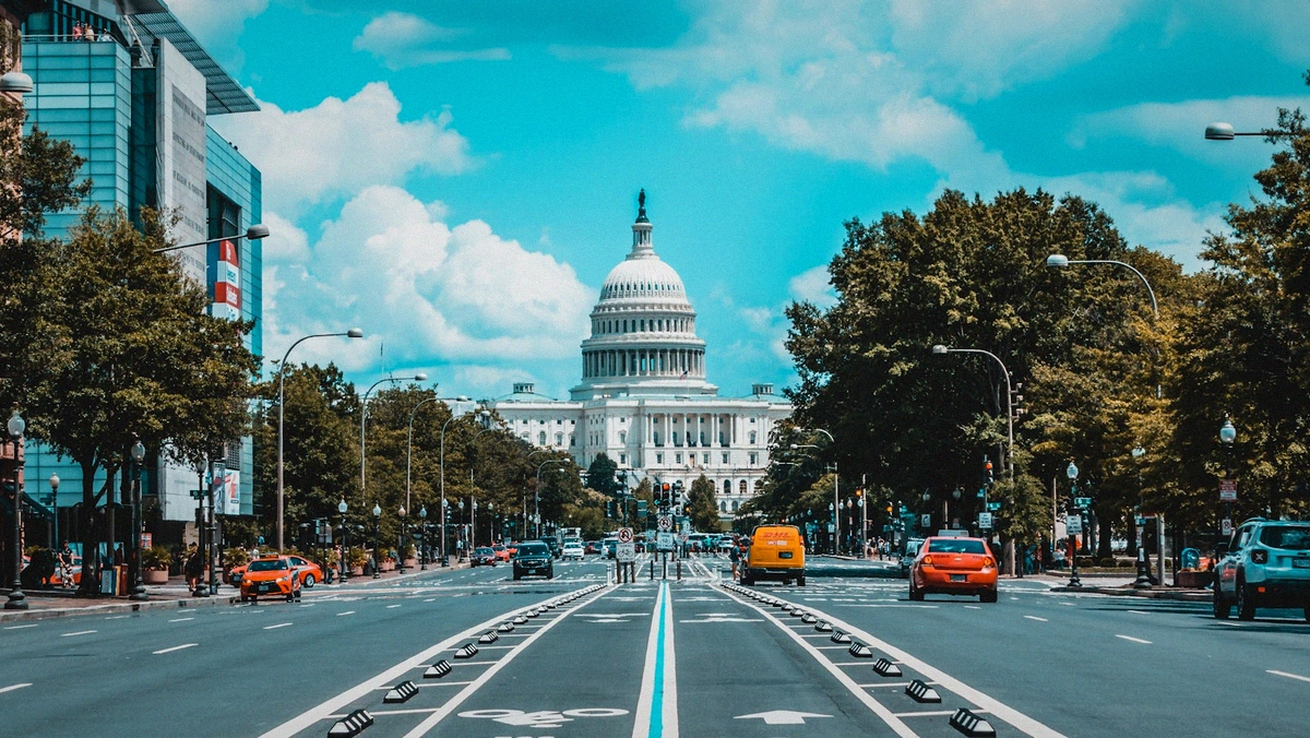 stopgap CR funding view of the US Capitol exterior on a clear daytime avenue