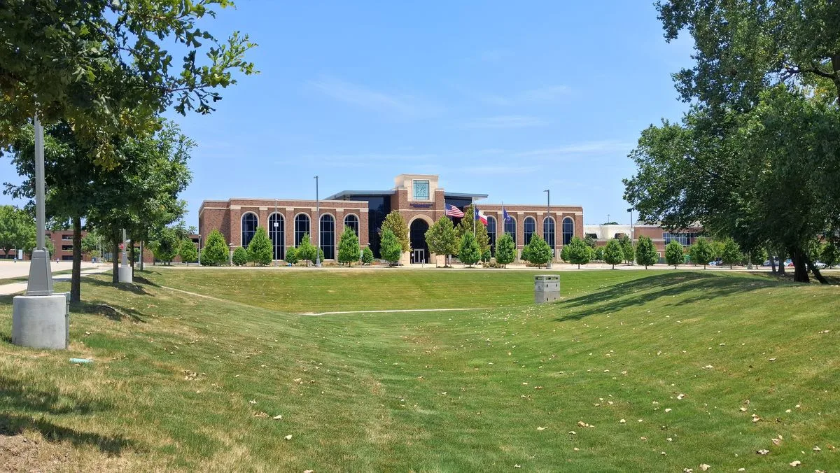 Collin College McKinney Campus building seen across a lawn, one of the sites in the Collin College bond plan
